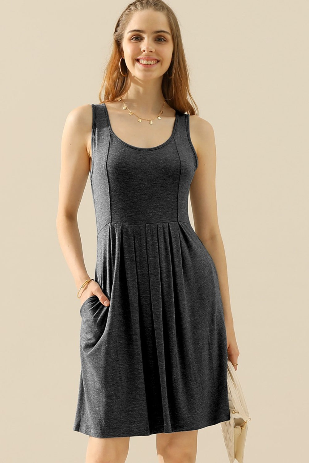 Doublju Full Size Round Neck Ruched Sleeveless Dress with Pockets | Gulf Resellers